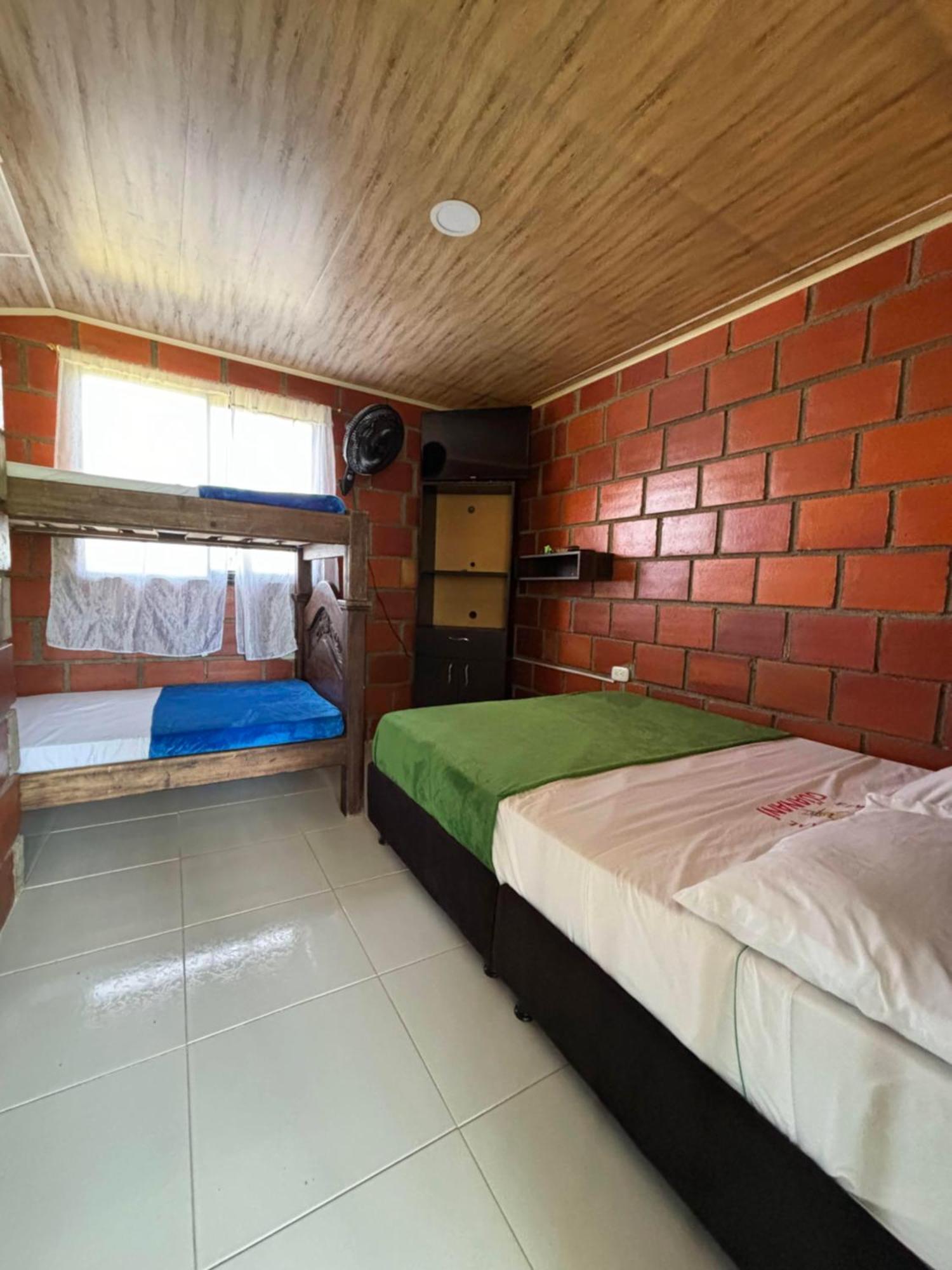 Finca Vacacional Guanani Socorro Pokoj fotografie